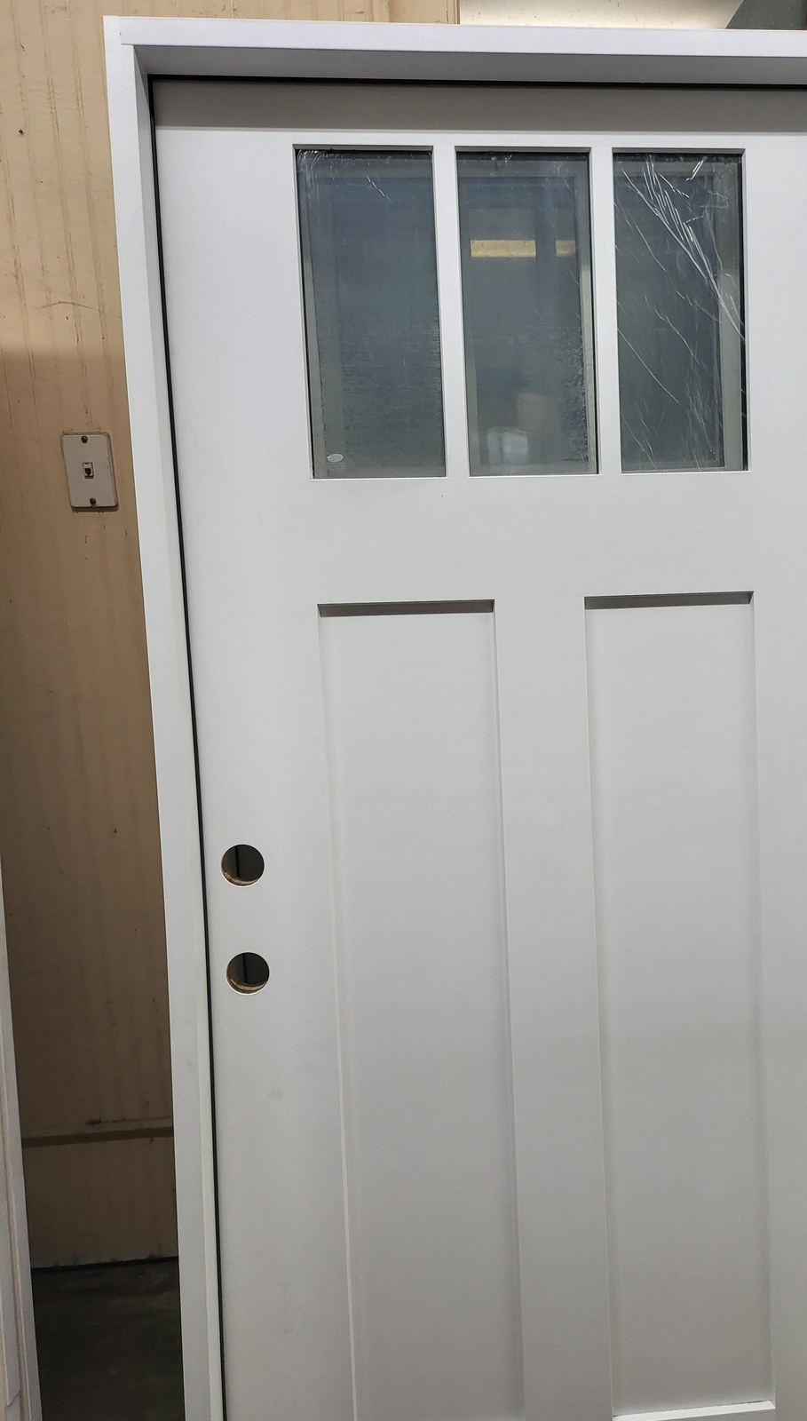 Craftsman 3-lite over 2-panel fiberglass exterior door — in stock at Norwood Supply